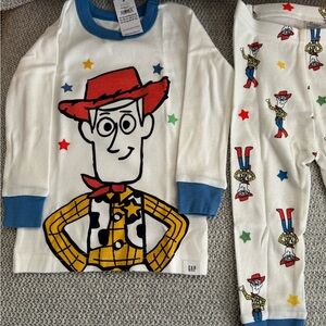 GAP Pixar Toy Story Woody Pajamas - size 12–18 months